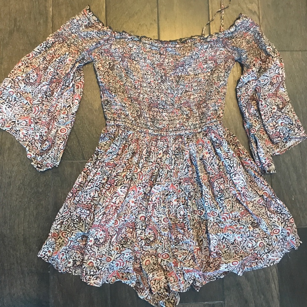 Smocked belle sleeve romper
